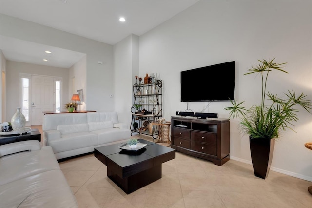 living room featuring light tile patterned flooring