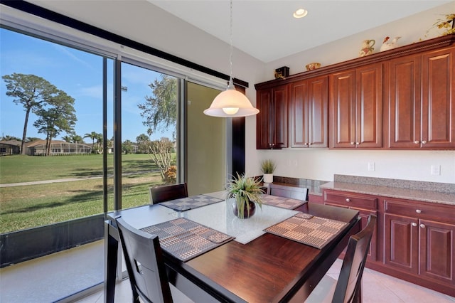 dining room with light tile patterned flooring