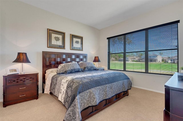 bedroom with light carpet