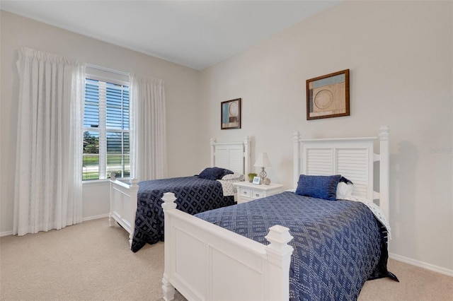 bedroom with light carpet