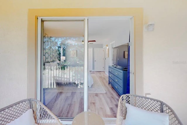 bedroom with light hardwood / wood-style floors