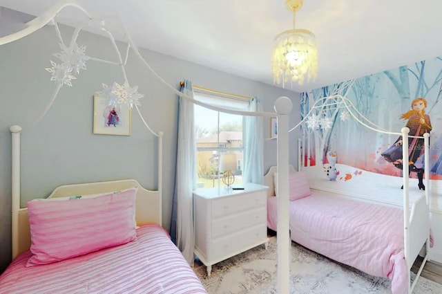 bedroom with an inviting chandelier