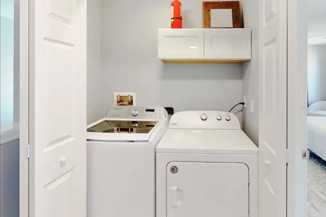 laundry area with washer and clothes dryer