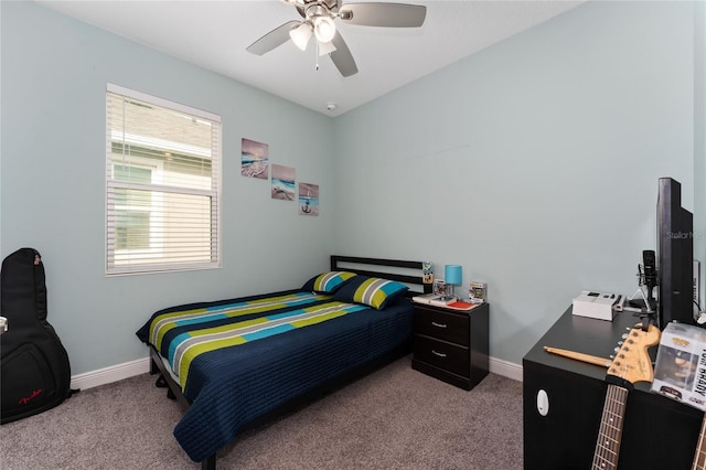 bedroom featuring light carpet and ceiling fan