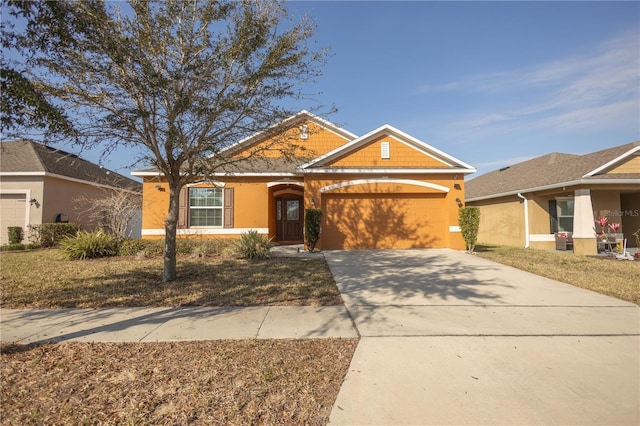 view of front of home with a garage