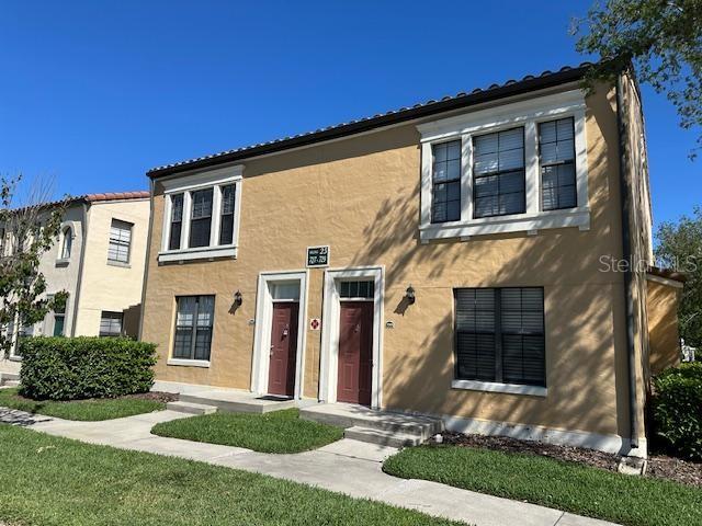 view of front of property with a front lawn