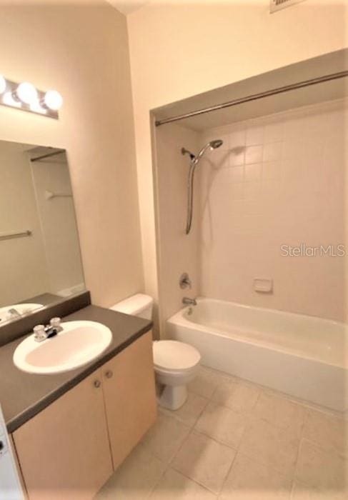 full bathroom with washtub / shower combination, vanity, and toilet