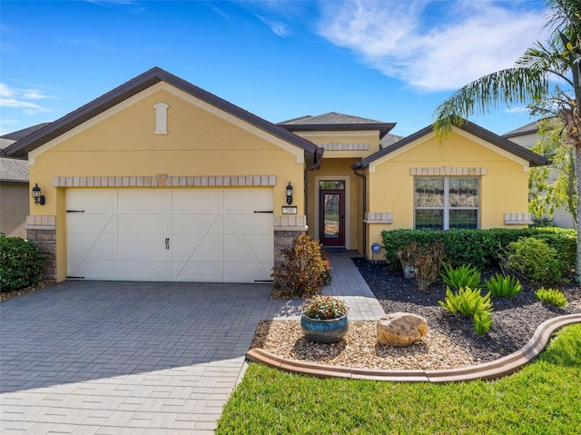 ranch-style home with a garage