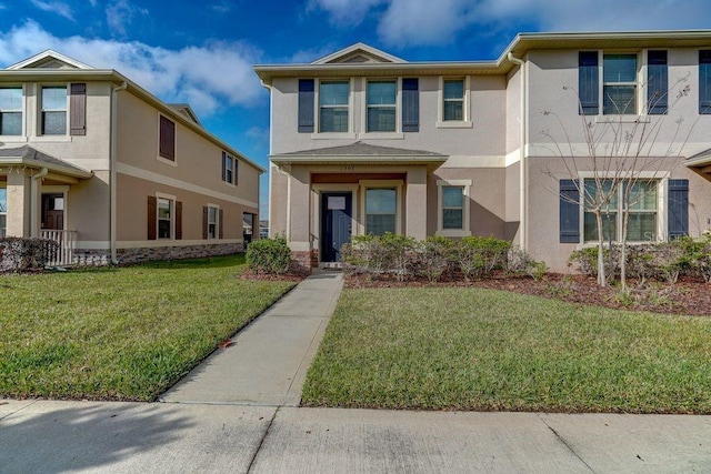 view of front facade with a front yard