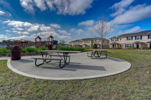 view of property's community featuring a yard