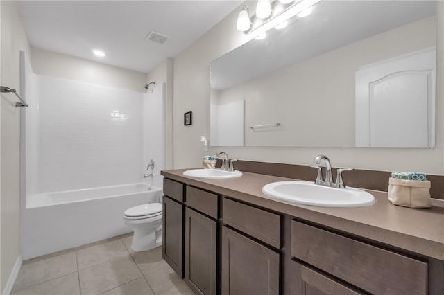 full bathroom with tile patterned flooring, vanity, bathtub / shower combination, and toilet