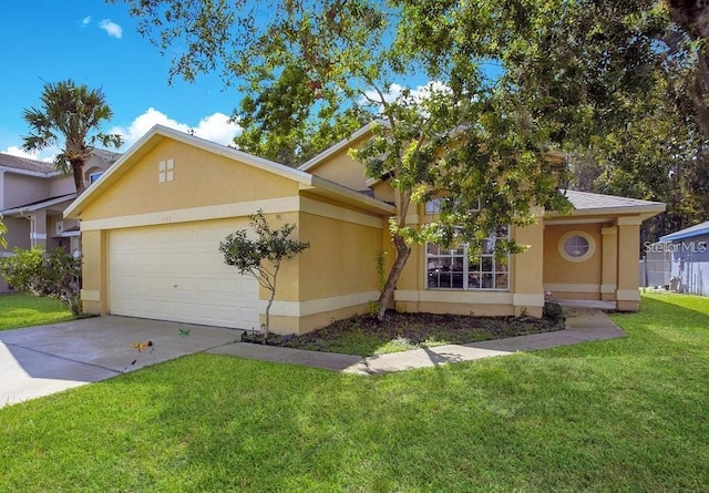 view of front of home featuring a garage and a front yard