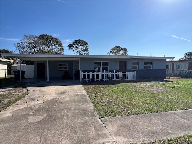 single story home with a carport and a front lawn