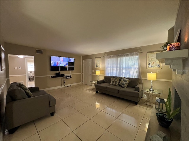 living room with light tile patterned floors