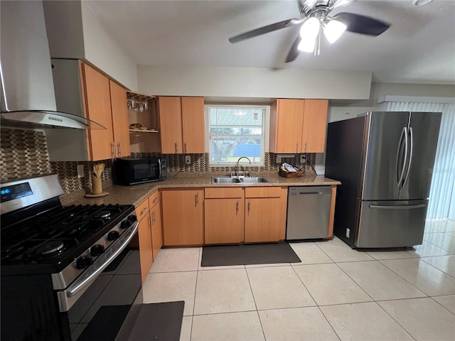 kitchen with appliances with stainless steel finishes, ventilation hood, tasteful backsplash, sink, and light tile patterned floors