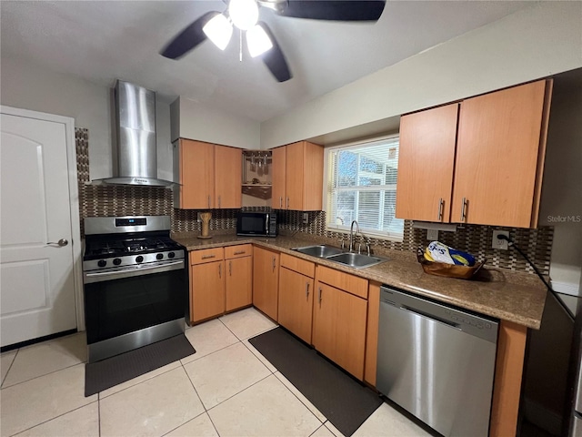 kitchen featuring light tile patterned flooring, wall chimney exhaust hood, sink, stainless steel appliances, and backsplash