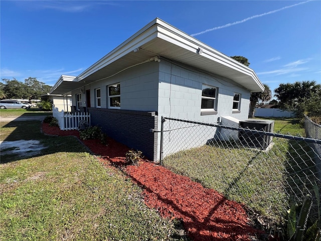 view of property exterior featuring a yard