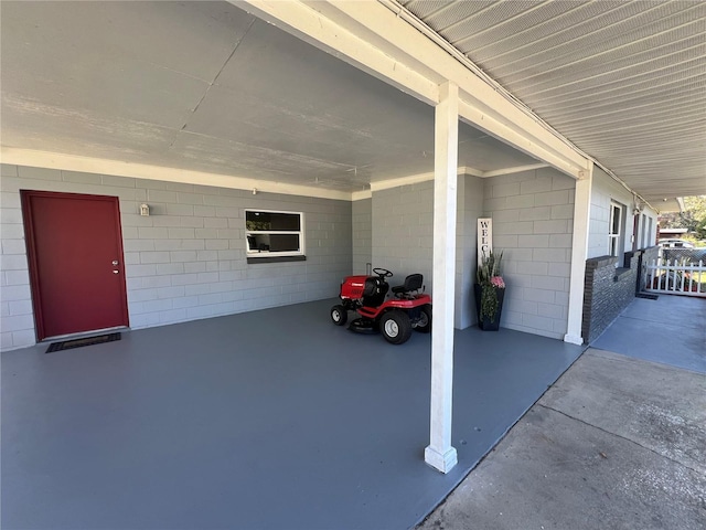 exterior space with a carport