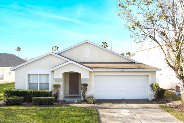 single story home with an attached garage, a shingled roof, driveway, stucco siding, and a front yard