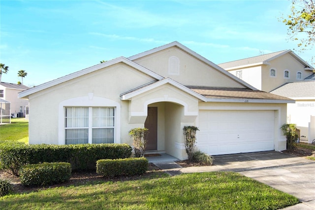 ranch-style home with an attached garage, a shingled roof, driveway, stucco siding, and a front lawn