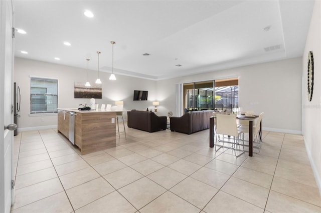 kitchen featuring visible vents, baseboards, appliances with stainless steel finishes, light tile patterned flooring, and recessed lighting