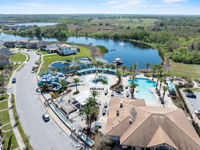 birds eye view of property featuring a water view