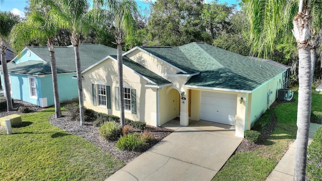 ranch-style house featuring roof with shingles, central air condition unit, stucco siding, an attached garage, and driveway