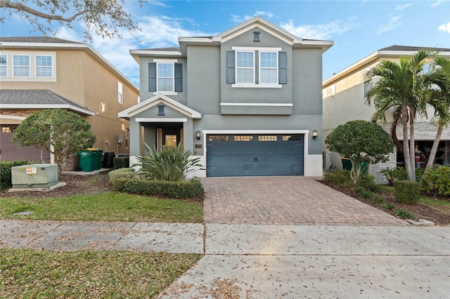 front of property featuring a garage