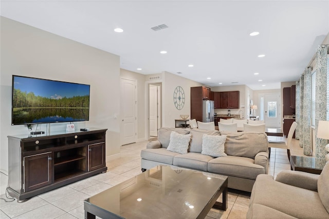 living room featuring light tile patterned floors