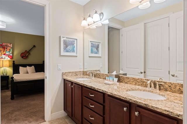 bathroom with vanity and tile patterned flooring