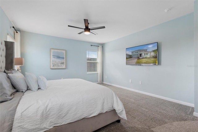 139 Aces High Ln, Davenport, FL 33896 - bedroom with carpet flooring, baseboards, and ceiling fan