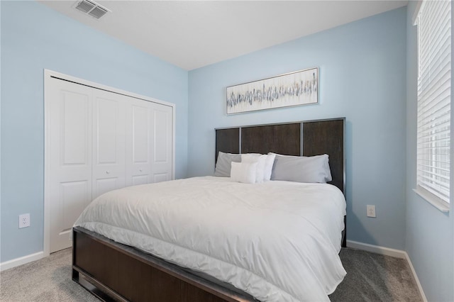 139 Aces High Ln, Davenport, FL 33896 - carpeted bedroom with a closet, baseboards, visible vents, and multiple windows