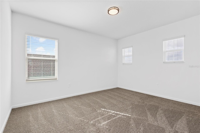 139 Aces High Ln, Davenport, FL 33896 - empty room with baseboards and carpet