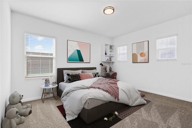 139 Aces High Ln, Davenport, FL 33896 - carpeted bedroom with baseboards