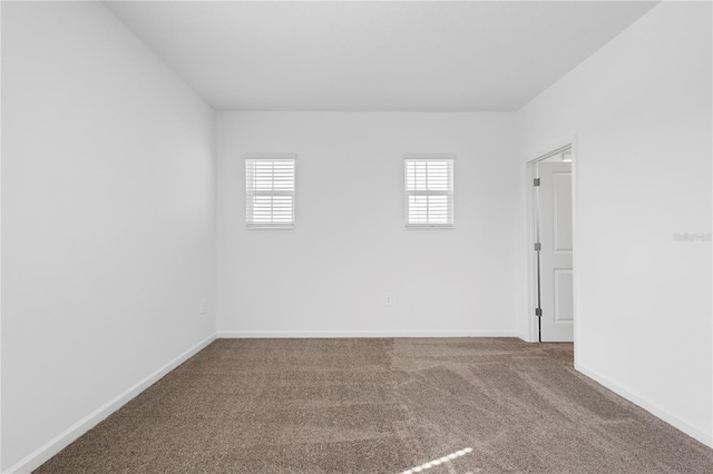 139 Aces High Ln, Davenport, FL 33896 - unfurnished room with carpet floors and baseboards