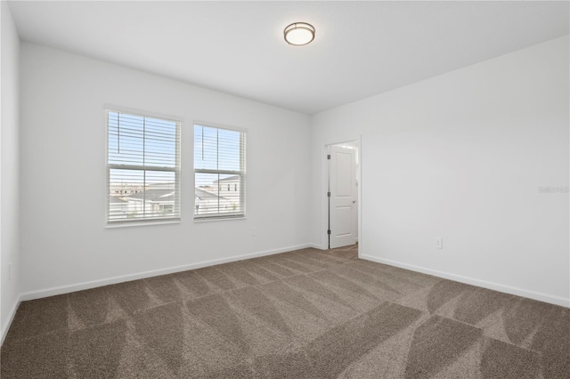 139 Aces High Ln, Davenport, FL 33896 - empty room featuring carpet flooring and baseboards