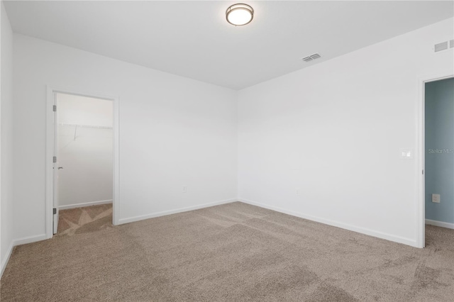 139 Aces High Ln, Davenport, FL 33896 - spare room with carpet floors, baseboards, and visible vents