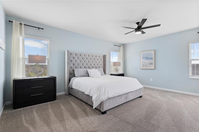 139 Aces High Ln, Davenport, FL 33896 - carpeted bedroom featuring multiple windows, baseboards, and ceiling fan
