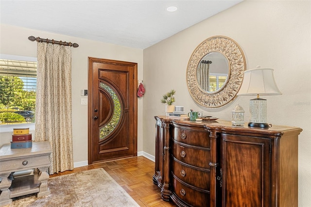 entrance foyer with light parquet floors