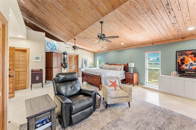 bedroom with lofted ceiling, light tile patterned floors, wood ceiling, and ceiling fan