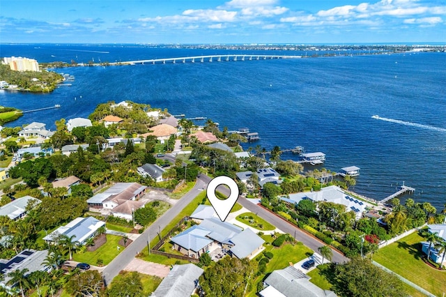 birds eye view of property featuring a water view