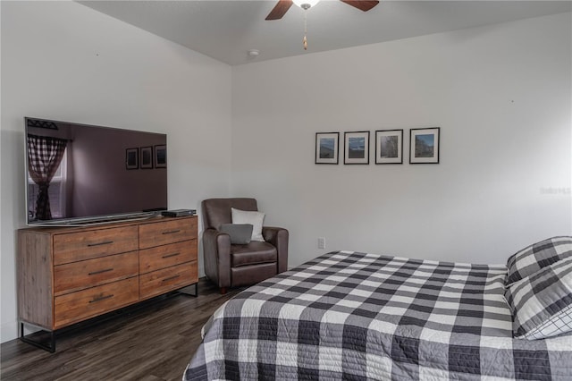 bedroom featuring dark hardwood / wood-style floors and ceiling fan