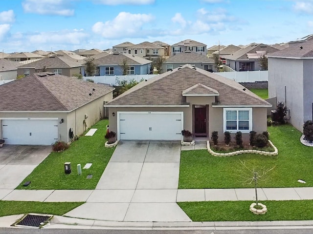 view of front of home with an attached garage, concrete driveway, a residential view, stucco siding, and a front lawn