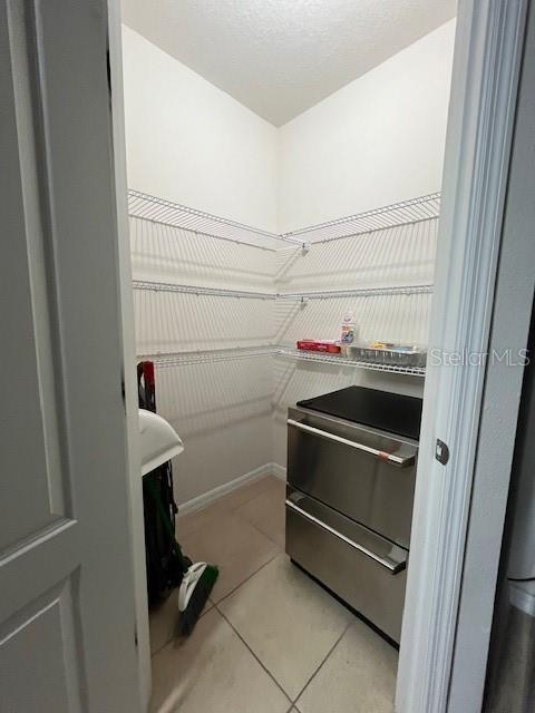 interior space featuring tile patterned flooring