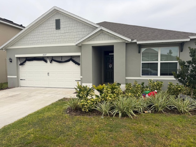 1827 Silverbell Loop, Haines City, FL 33844 - view of front of house with an attached garage, concrete driveway, stucco siding, and a front lawn