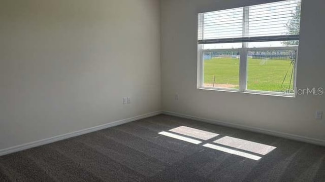 1827 Silverbell Loop, Haines City, FL 33844 - unfurnished room featuring carpet flooring and baseboards