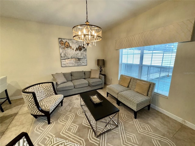 living room featuring tile patterned flooring and an inviting chandelier