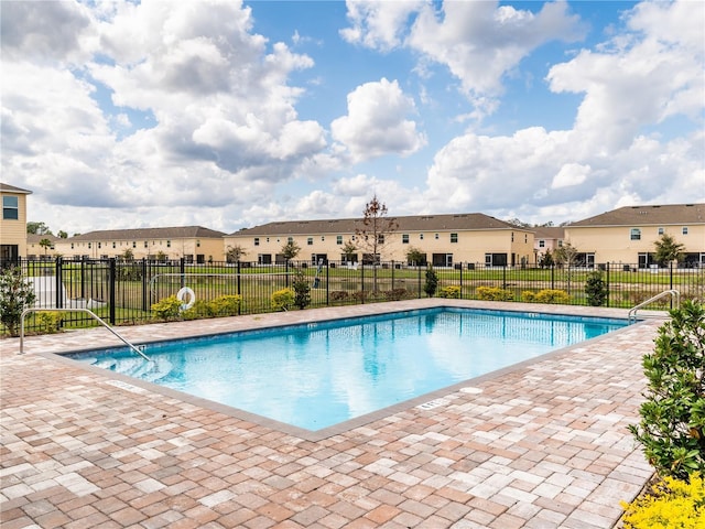 view of swimming pool featuring a patio