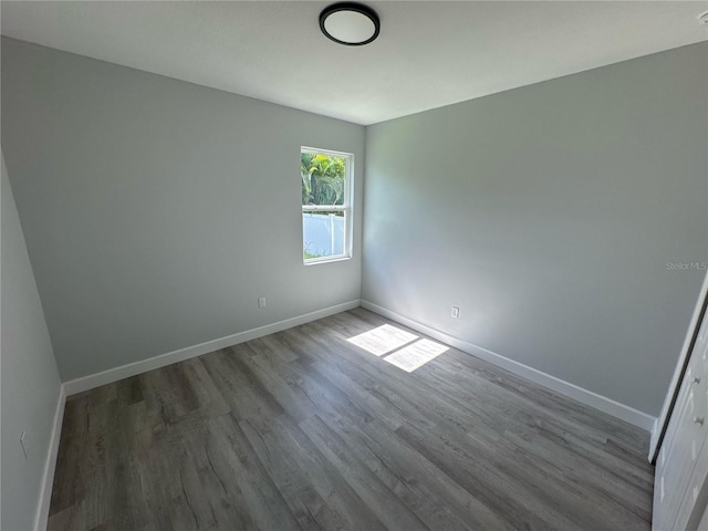 104 Australian Dr, Rotonda West, FL 33947 - spare room with wood finished floors and baseboards