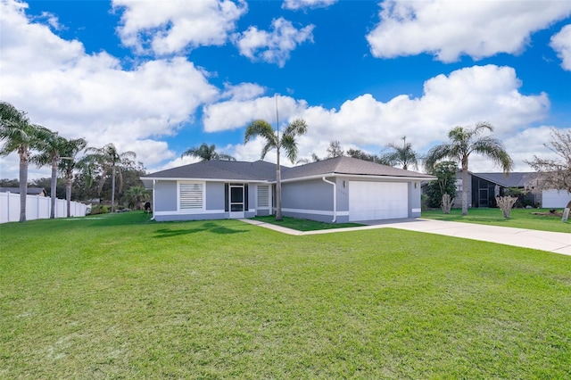 single story home featuring a garage and a front lawn